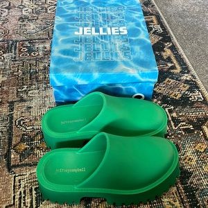 Popular Jeffrey Campbell clogs, size 7 in green